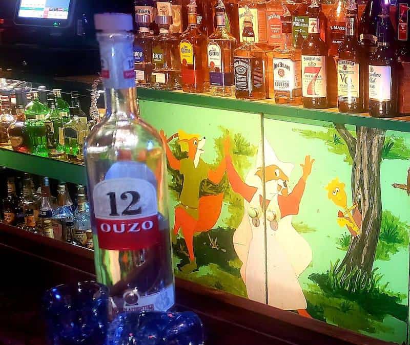 Robin Hood and Maid Marion painting behind the bar of the Robin Hood in Colorado Springs