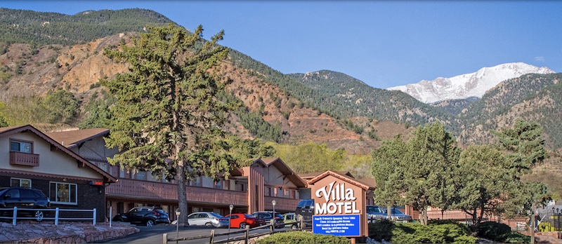 The Villa Motel in Manitou Springs with Pikes Peak in the background