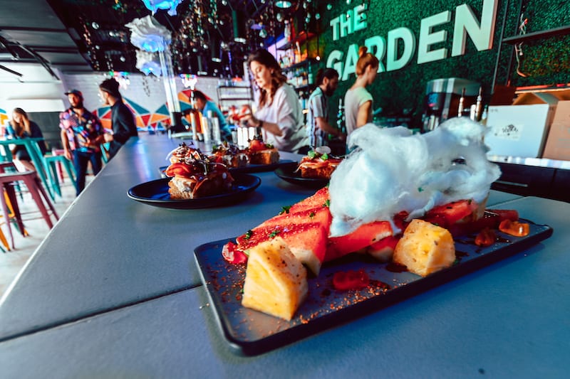 Cotton candy garnishes a fruit plate at new patio bar Colorful Colorado in Colorado Springs.
