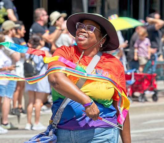 5 Best Things to Do in Colorado Springs This Weekend A woman marches in the Pikes Peak Pride Fest parade in Colorado Springs