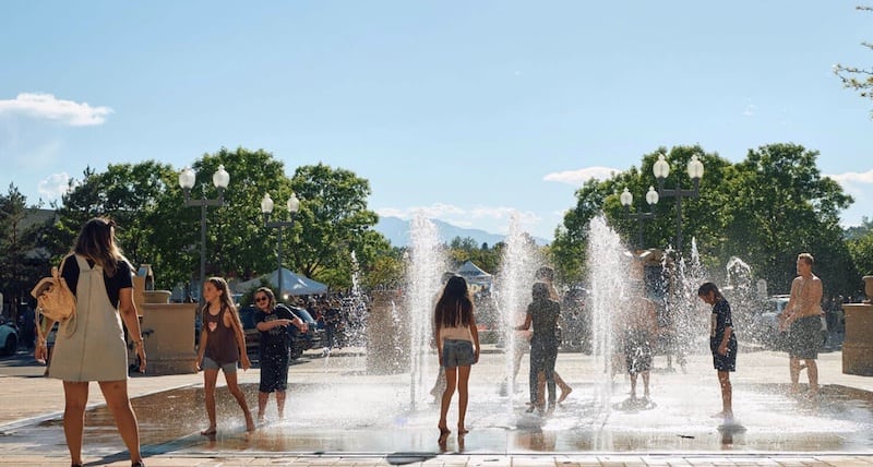 Kids play in the First and Main Town Center Fountain, one of the favorite splash parks in Colorado Springs.