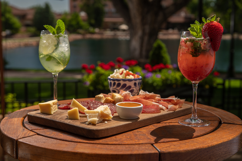Cocktails and appetizers at Ristorante Del Lago on one of the best patios in Colorado Springs for outdoor dining