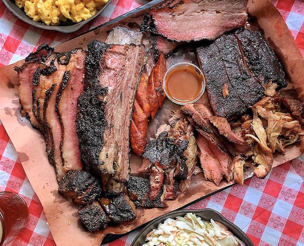Tray of smoked meats at AJ's Pit Bar-B-Q in Denver, one of the Michelin Guide Colorado Bib Gourmand award winners.