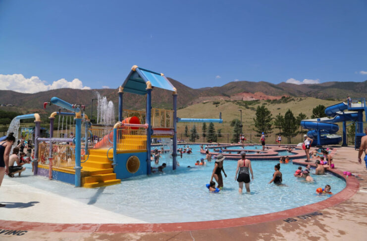 Kids play in the water at Wilson Ranch Pool, a favorite public swimming pool in Colorado Springs.
