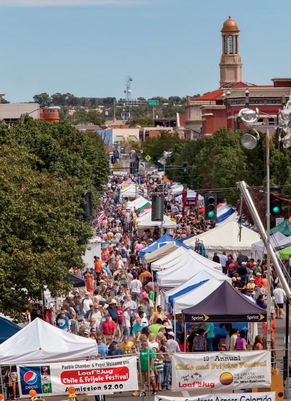 A crowded downtown street at the Pueblo Chile Festival. 