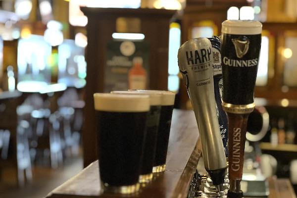 Harp and Guinness bar taps at Jack Quinn's Irish Pub