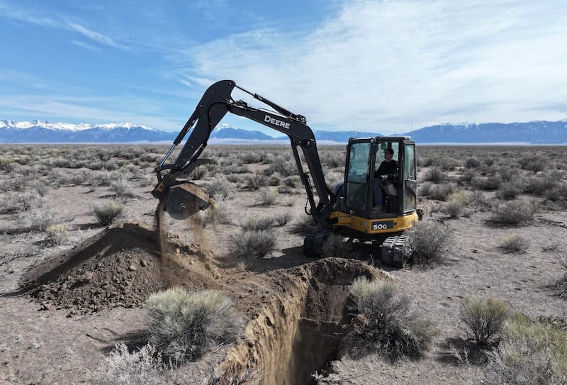 Machine digs at Kosmos Resort near the Great Sand Dunes National Park
