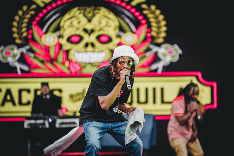 A rapper performs on stage at the Tacos and Tequila Festival, one of the top festivals in Colorado Springs this summer.