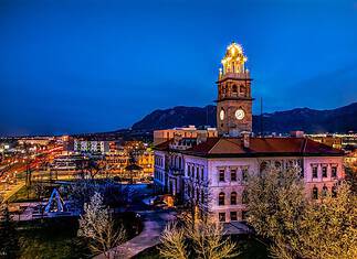 New Additions Coming This Summer The city of Colorado SPrings lit up at night.