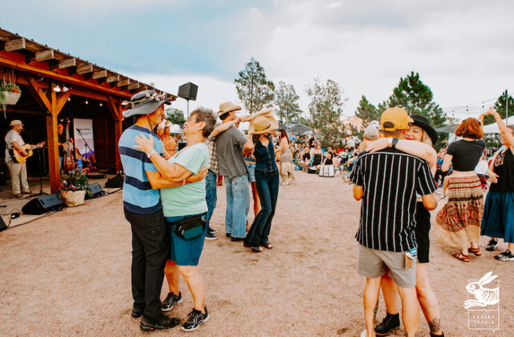Dancers sway to the live music at Rocky Mountain Flower Fest.