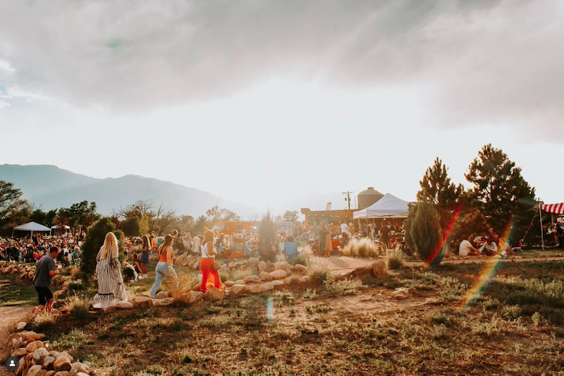Sunbursts as people gather for Rocky Mountain Flower Fest at Venetucci Farm in Colorado Springs.