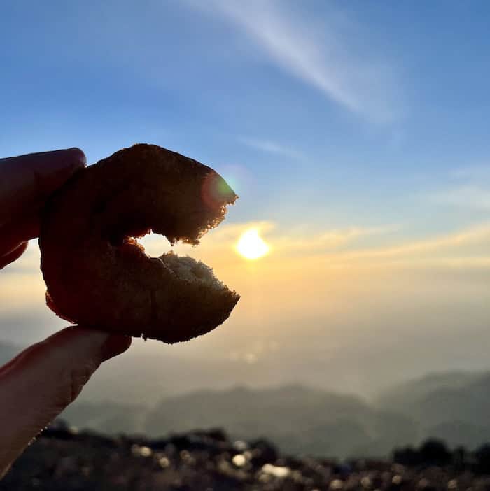 A world-famous donut and sunrise on Pikes Peak.