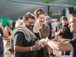 All the Best Summer Festivals in Colorado Springs A couple gets samples at Taste of Pikes Peak, Colorado Springs premier food festival