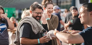 All the Best Summer Festivals in Colorado Springs A couple gets samples at Taste of Pikes Peak, Colorado Springs premier food festival
