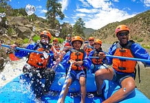 A family white water rafting in Colorado on the Arkansas River with Echo Canyon River Expeditions