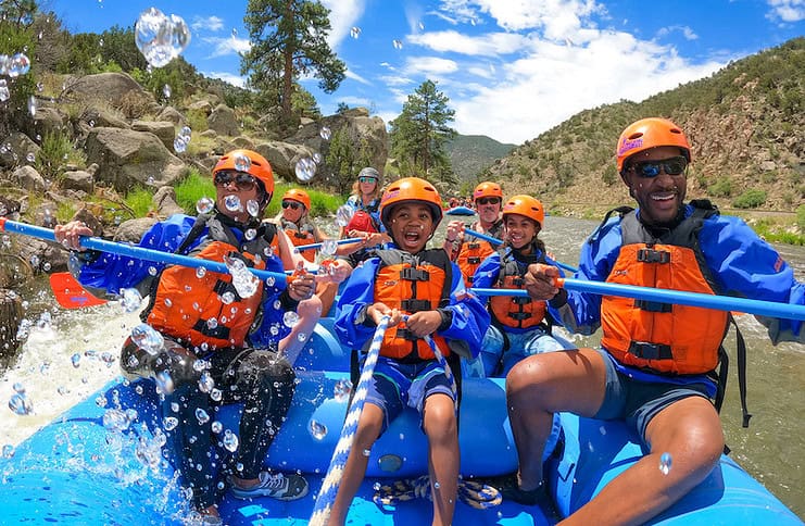 A family white water rafting in Colorado on the Arkansas River with Echo Canyon River Expeditions