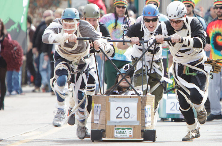 A team of mummies race in the Manitou Springs Emma Crawford Coffin Races during Halloween in Colorado Springs