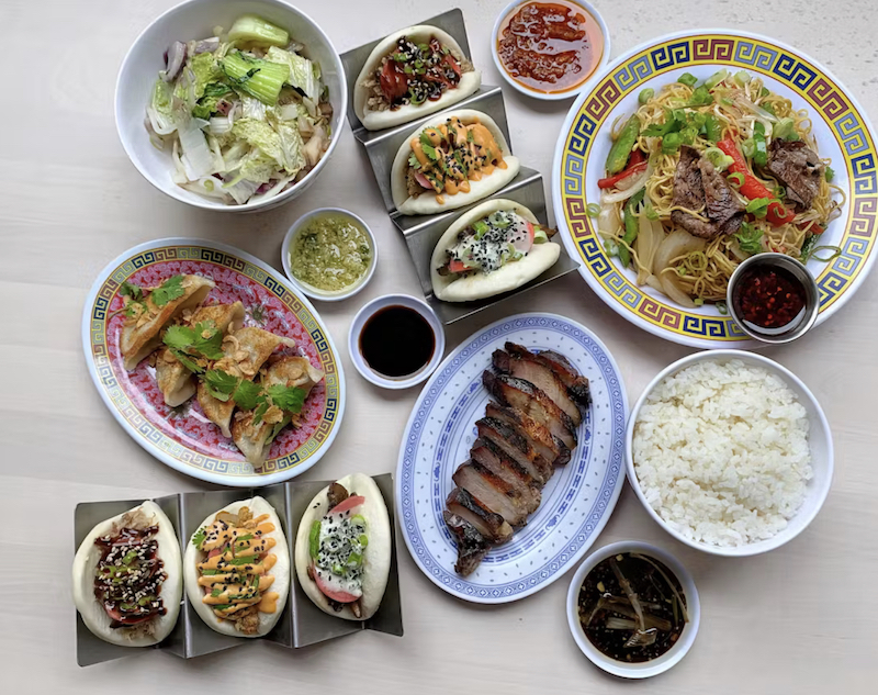 An array of Chinese food dishes at MakFam, one of he new Michelin Award winners in Denver in 2024