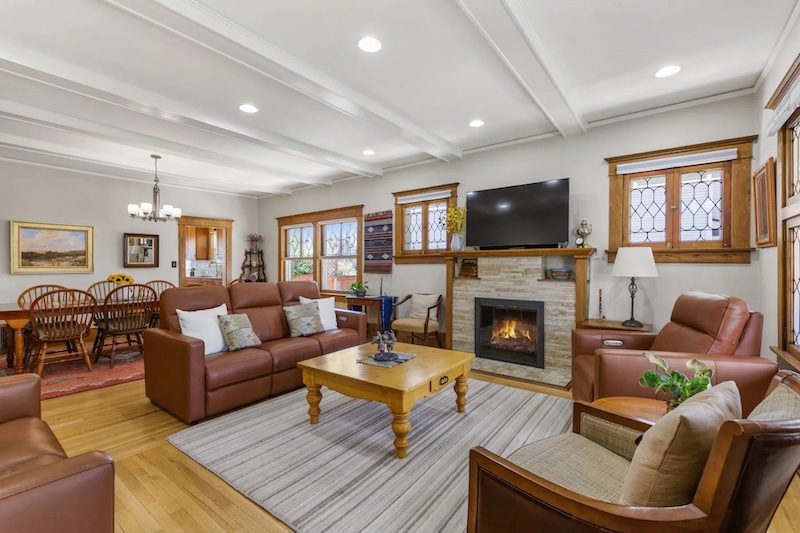 Inside the living room and dining room of the Craftsman bungalow home for sale in the Old North End neighborhood of Colorado Springs