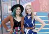 Where to Thrift in Colorado Springs two women stand in front of colorful mural in vintage clothing.