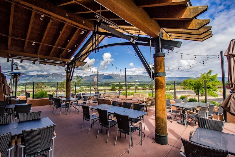 The mountain scenery from the patio at Colorado Mountain Brewery ranks as one of our best restaurants with a view in Colorado Springs.