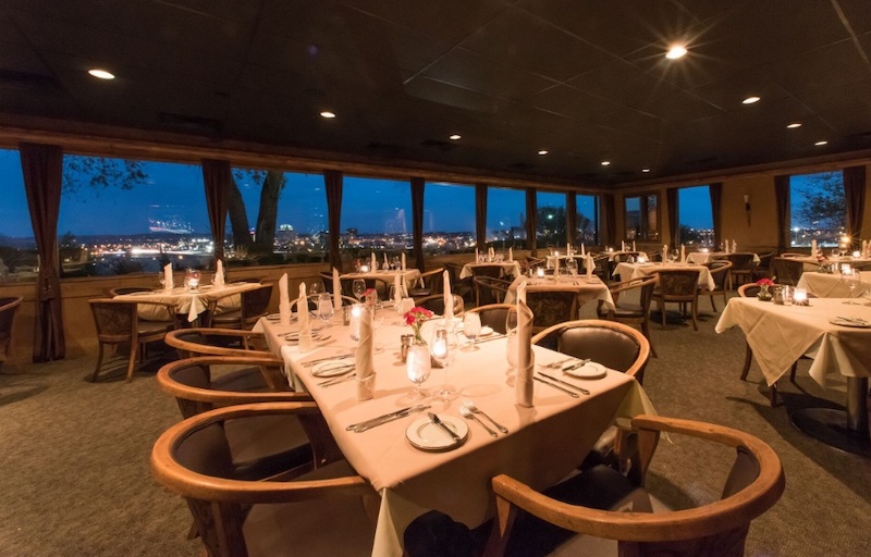 City light views through the windows at the Peppertree restaurant in Colorado Springs.