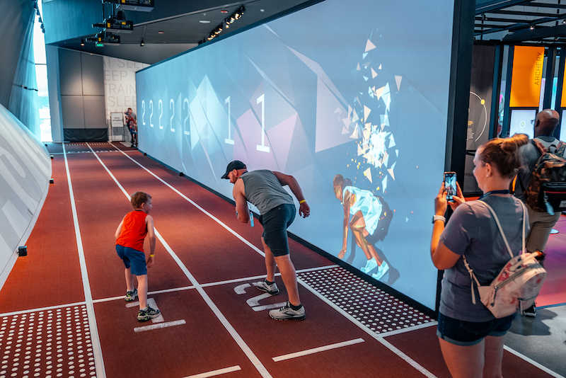 Dad and son on the starting blocks at the U.S. Olympic Museum in Colorado Springs.