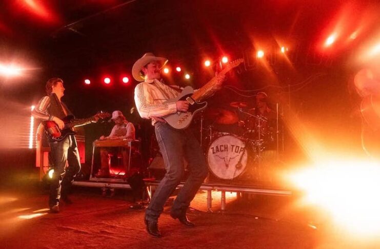 Zach Top live music concert at the Grizzly Rose, similar to the scene at the new Whiskey Rose in Colorado Springs