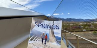 The Colorado Springs Relocation Guide 2026 on the Park Union Bridge where its cover photo was taken.