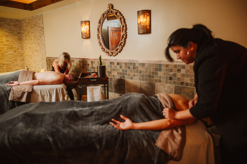 A couples massage at the Spa at Flying Horse, one of the best spas in Colorado Springs.