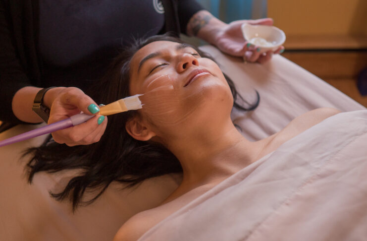 A woman enjoys a facial at SunWater Spa, one of the best spas in Colorado Springs