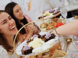 Celebrate Mom at These Delicious Mother’s Day Brunches and Teas Women laughing at afternoon tea at Toodles Tea Room in Colorado Springs