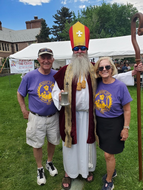 Saint Arnold with Brian and Becky Bennett, co-chairs of the Feast of Saint Arnold. 