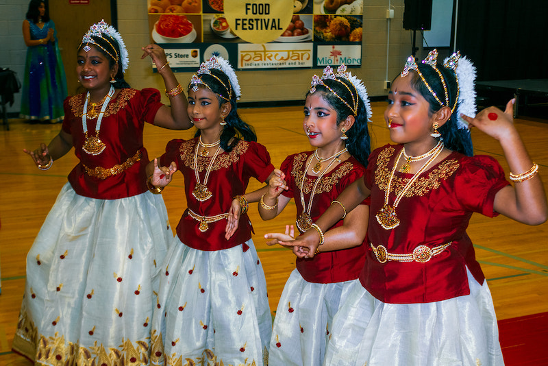 Young dancers in traditional Indian dresses at the Indian Food Festival in Colorado Springs.