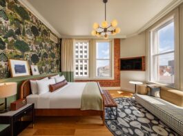 6 Reasons We Love the Mining Exchange Hotel A corner king room with historic brick wall, hardwood floors and stylish finishes, all amenities that make the Mining Exchange Hotel one of the best hotels in Colorado Springs.