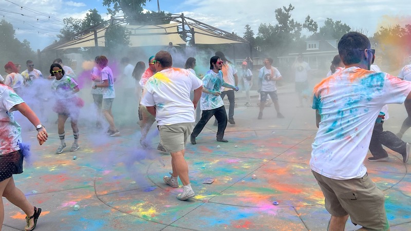 People throw colored powder at each other in Bristol Brewing's Color Fight, one of the best things to do in Colorado Springs this weekend.