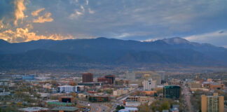 Sunset overlooking downtown, Pikes Peak and the neighborhoods of Colorado Springs on the hillsides