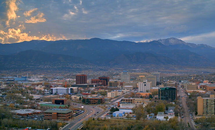 Sunset overlooking downtown, Pikes Peak and the neighborhoods of Colorado Springs on the hillsides