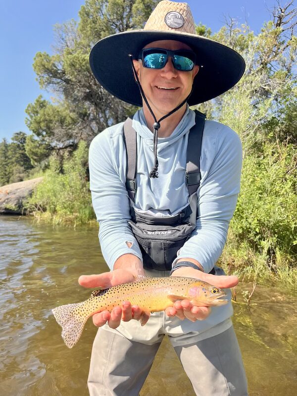Jeremy Jones holds a cutthroat trout caught on the Eagle River near Vail. 