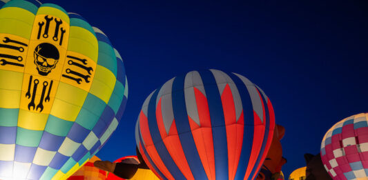 Labor Day Lift Off Celebrates 50 Years Hot air balloons glow at Labor Day Lift Off, the biggest hot air balloon festival in Colorado Springs.