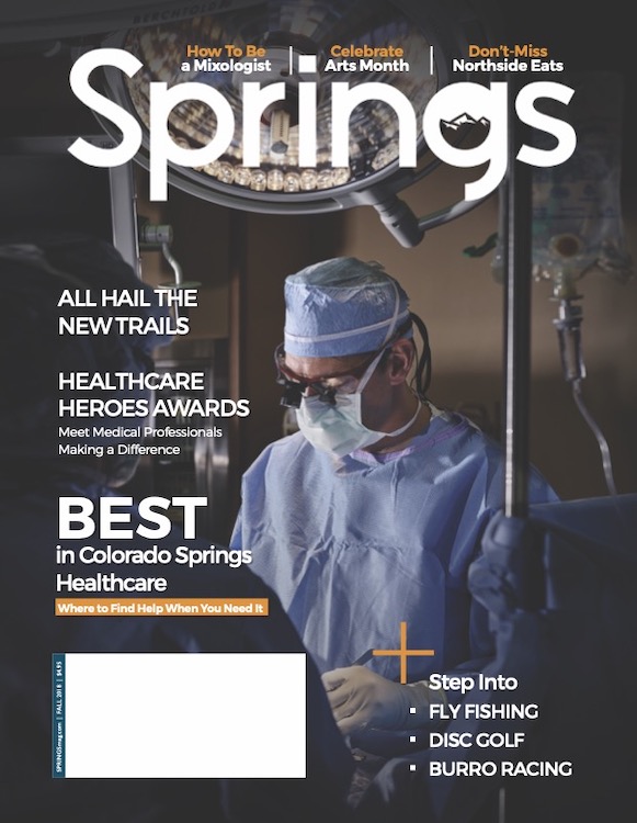 Inside the OR with a surgeon at Penrose Hospital on the cover of Springs magazine.