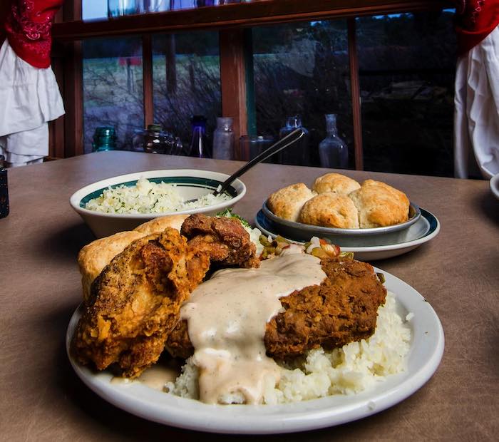 Chicken fried steak and fixings at the family style Juniper Valley Ranch is one of the most unique restaurants in Colorado Springs.