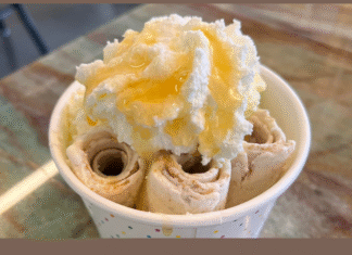 MB’s Something Sweet Rolled ice cream served in a cup with whipped cream topping.