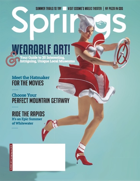 A woman in a vintage car fashion on the cover of Springs magazine