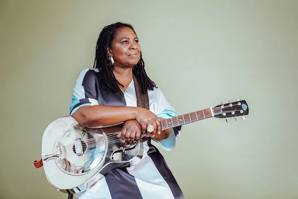 Gospel blues artist Ruthie Foster with her guitar. She will headline Blues on the Mesa 2025 in Colorado Springs.