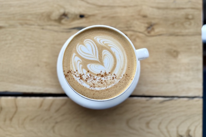Overhead view of latte art on a Pumpkin Pie Latte at Hold Fast Coffee. 