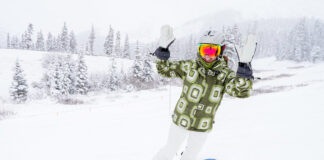 All the Colorado Ski Resort Opening Dates 2026-2027 A snowboarder celebrates at Opening Day of Arapahoe Basin. Will A Basin be the first Colorado ski resort to open for the season?