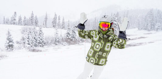 All the Colorado Ski Resort Opening Dates 2026-2027 A snowboarder celebrates at Opening Day of Arapahoe Basin. Will A Basin be the first Colorado ski resort to open for the season?