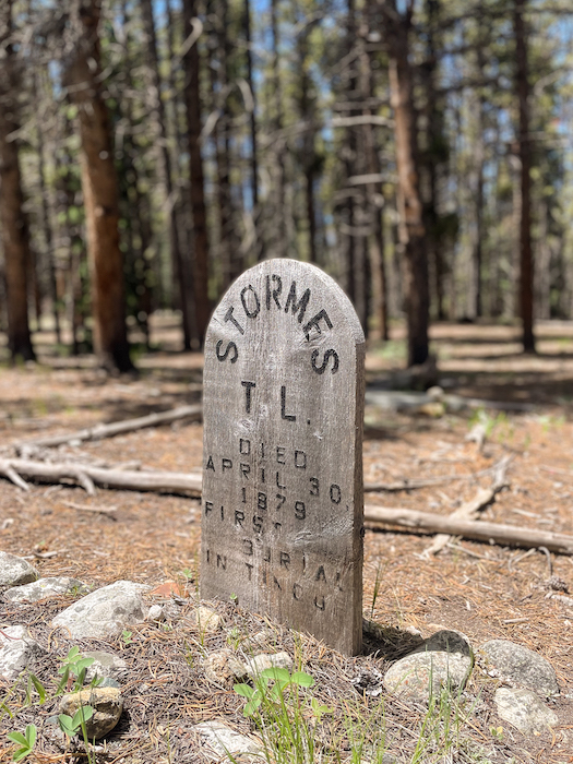 Historic wooden headstone of T.L. Stories in Tincup Cemetery, Colorado.