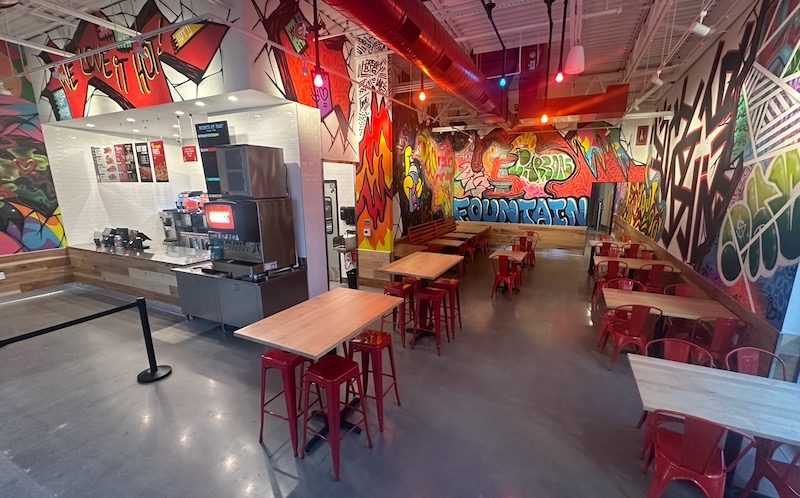 Graffiti art and signs inside Dave's Hot Chicken in Fountain, Colorado. 